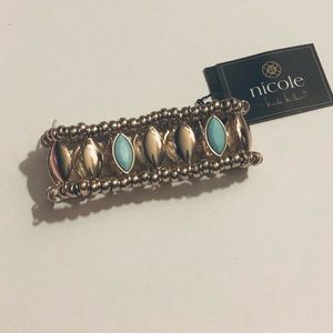 Teal and gold statement bracelet.